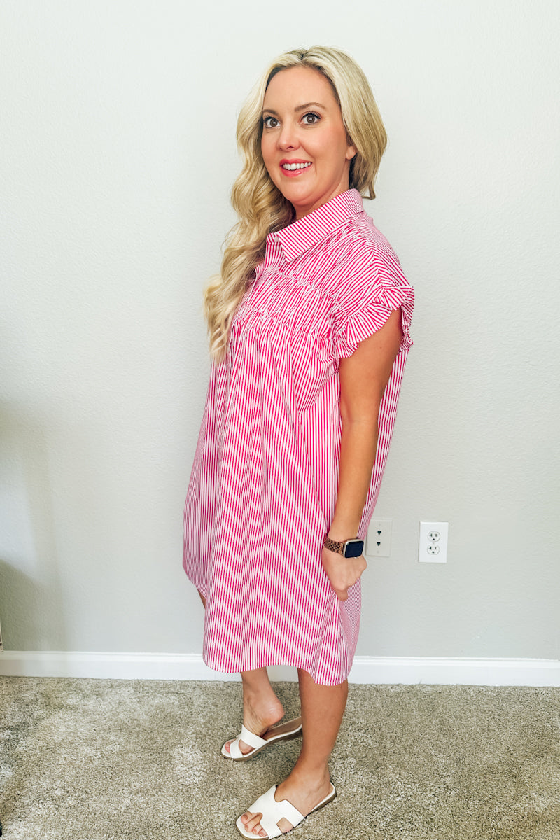 Right side view of the red and white striped Lexington shirtdress, highlighting the ruched yoke design, flutter sleeve, and effortless drape of this boutique dress.